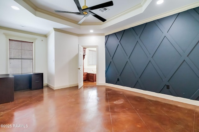 tiled spare room featuring ornamental molding, a raised ceiling, visible vents, and baseboards