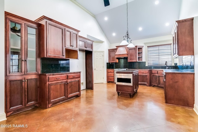 kitchen featuring decorative backsplash, dark countertops, premium range hood, open shelves, and gas stove