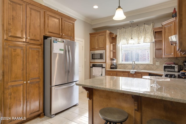 kitchen featuring stainless steel appliances, tasteful backsplash, brown cabinets, and open shelves