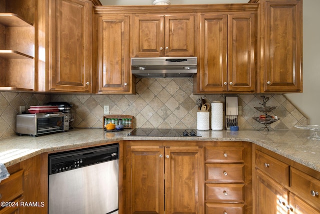 kitchen with black electric stovetop, brown cabinets, under cabinet range hood, and stainless steel dishwasher