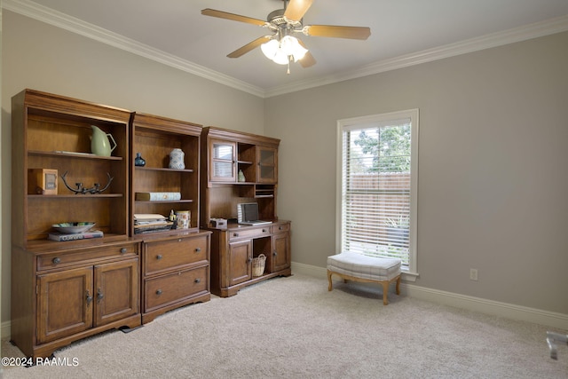 interior space with ceiling fan, ornamental molding, baseboards, and light colored carpet