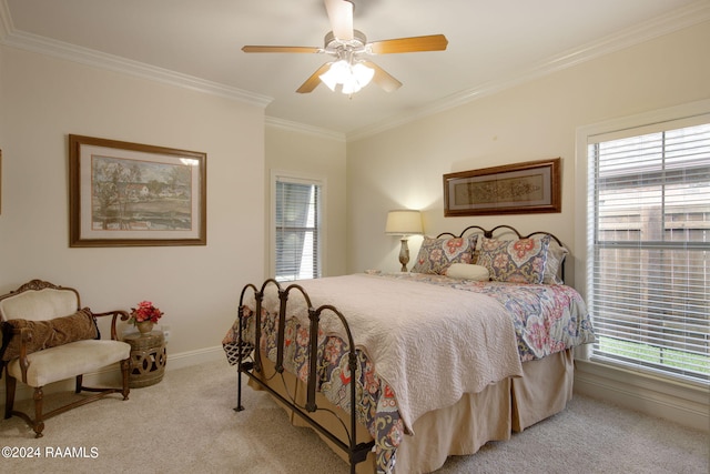 bedroom with ornamental molding, carpet, ceiling fan, and baseboards