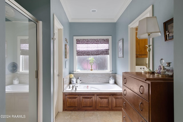 bathroom featuring a healthy amount of sunlight, tile patterned flooring, crown molding, and a bath