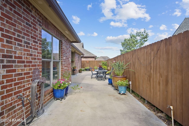 view of patio with a fenced backyard