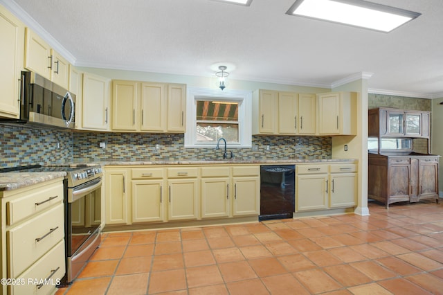 kitchen featuring decorative backsplash, appliances with stainless steel finishes, cream cabinets, crown molding, and a sink