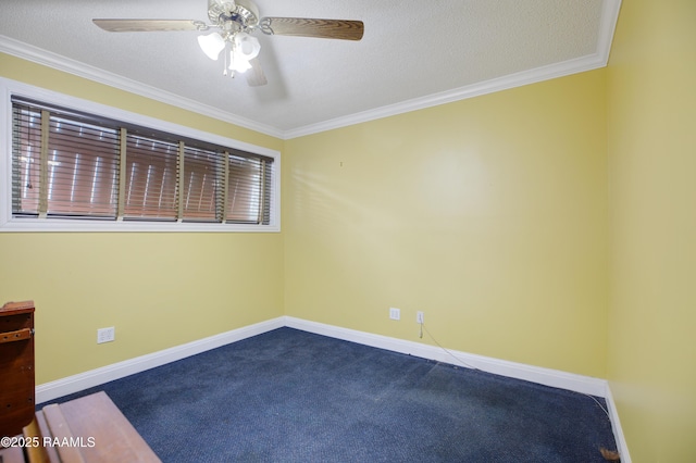 empty room featuring baseboards, ornamental molding, and dark colored carpet