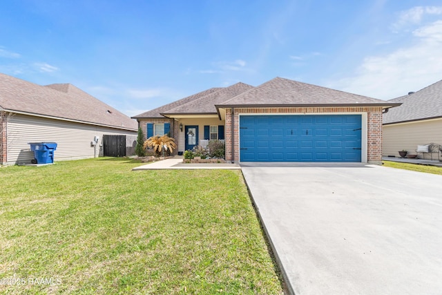 single story home with driveway, roof with shingles, an attached garage, a front yard, and brick siding