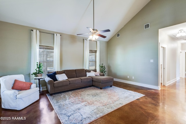 living area featuring visible vents, high vaulted ceiling, finished concrete floors, baseboards, and ceiling fan