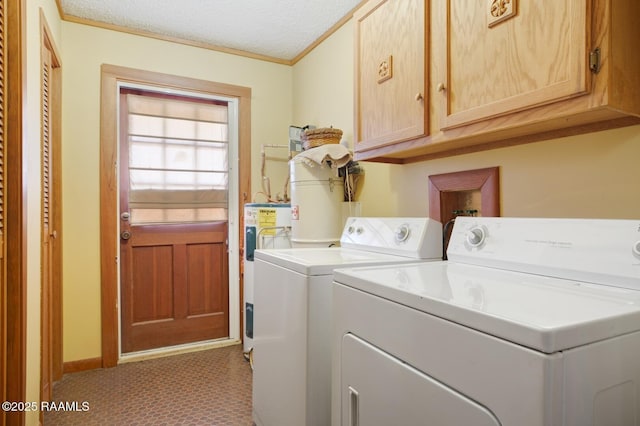 clothes washing area featuring cabinet space, crown molding, a textured ceiling, water heater, and separate washer and dryer