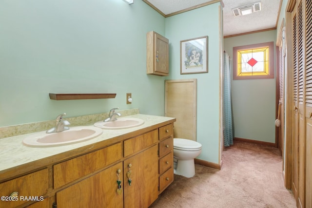 full bath with ornamental molding, a sink, and visible vents