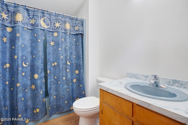 bathroom featuring a textured ceiling, vanity, toilet, and shower / bathtub combination with curtain