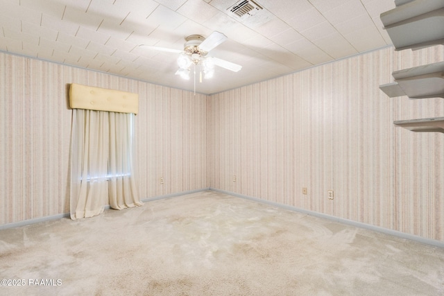 1410 S Chataignier Rd, Ville Platte, LA 70586 - unfurnished room featuring ceiling fan, carpet flooring, and wallpapered walls