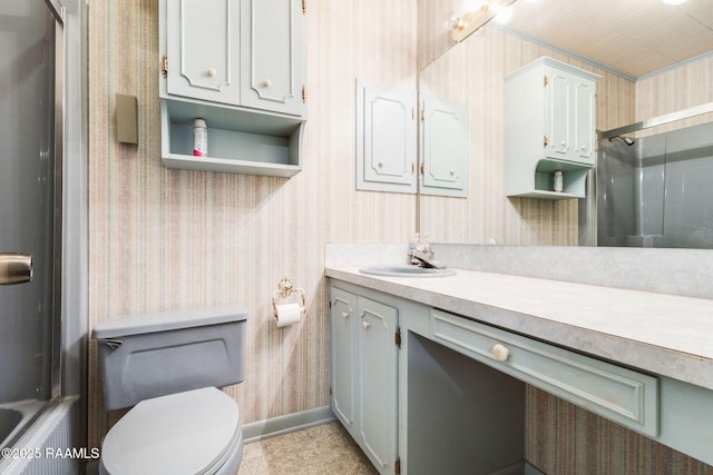 1410 S Chataignier Rd, Ville Platte, LA 70586 - full bath with wallpapered walls, vanity, and enclosed tub / shower combo