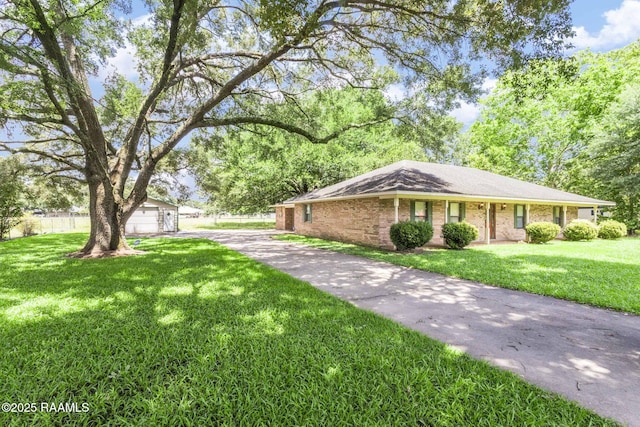 1410 S Chataignier Rd, Ville Platte, LA 70586 - view of front of home featuring a front yard and brick siding