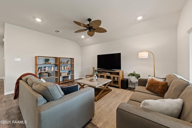 living area with ceiling fan, recessed lighting, wood finished floors, visible vents, and vaulted ceiling