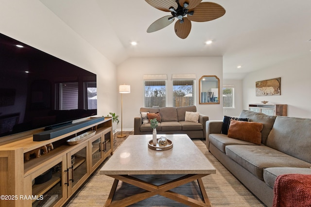 living area featuring recessed lighting, ceiling fan, and baseboards