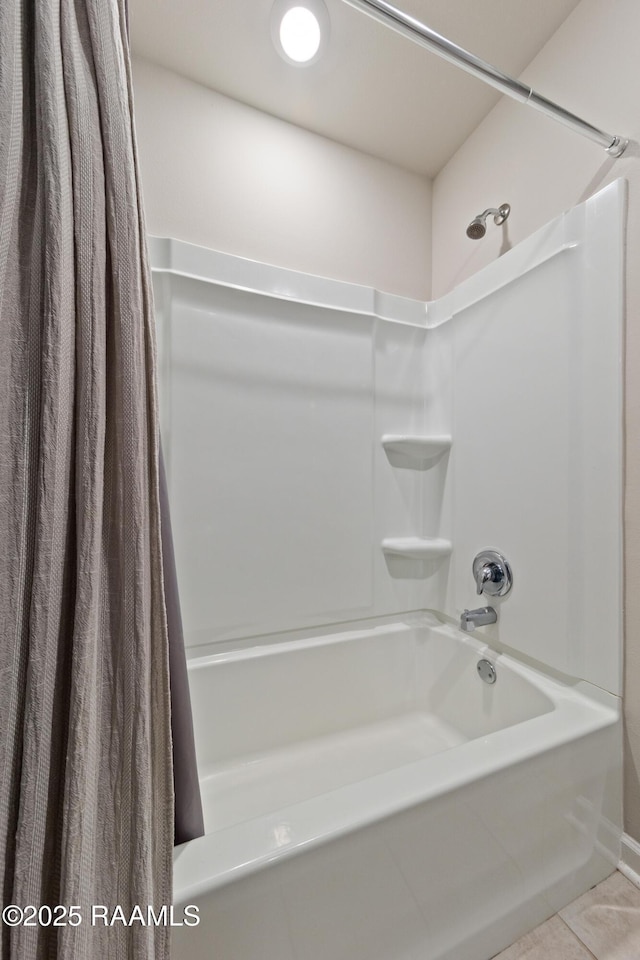 full bathroom with tile patterned flooring and shower / bathtub combination with curtain