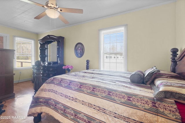 bedroom with crown molding, a ceiling fan, and baseboards