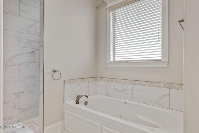 bathroom with walk in shower and a bath