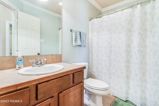 bathroom featuring toilet, tile patterned floors, ornamental molding, and vanity