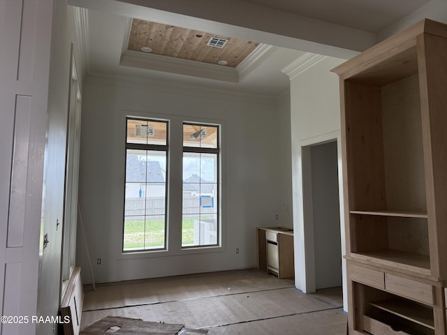 unfurnished bedroom featuring visible vents, wood ceiling, crown molding, and a tray ceiling