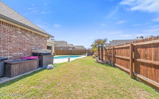 view of yard featuring a fenced backyard and a fenced in pool