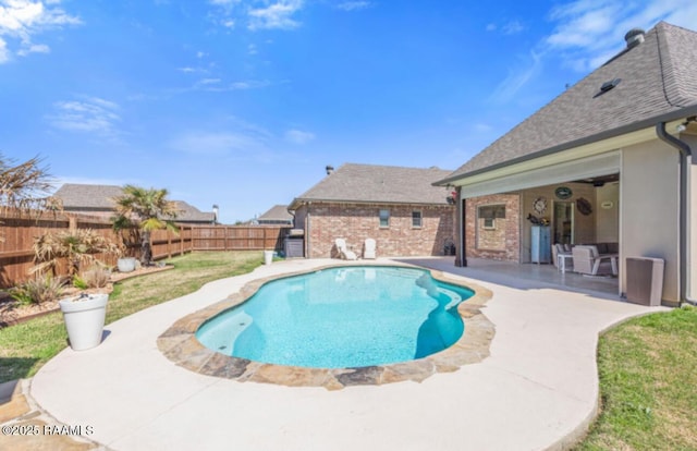 view of swimming pool with a patio, a fenced backyard, and a fenced in pool