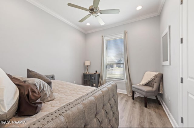 bedroom with light wood finished floors, baseboards, crown molding, and recessed lighting