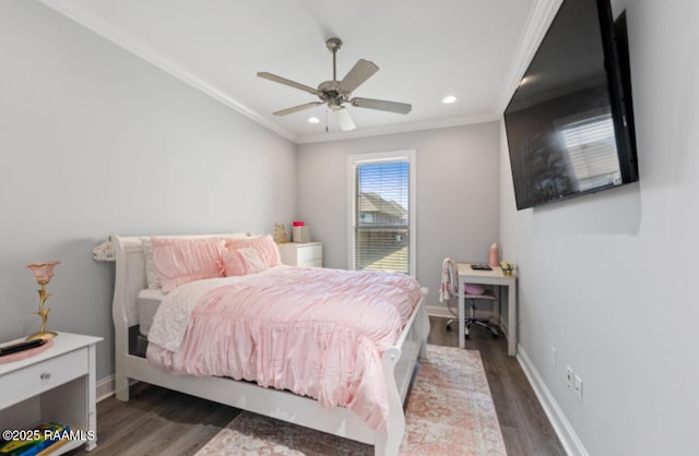 bedroom with baseboards, dark wood-style flooring, and crown molding