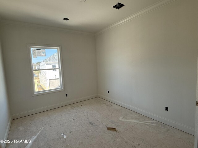 empty room with baseboards and ornamental molding