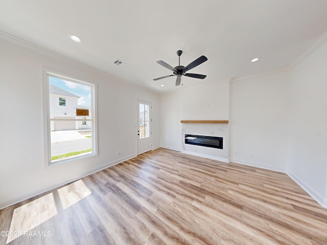 119 Chimney Rock Blvd, Lafayette, LA 70508 - unfurnished living room with ornamental molding, a premium fireplace, light wood-style flooring, recessed lighting, and a ceiling fan
