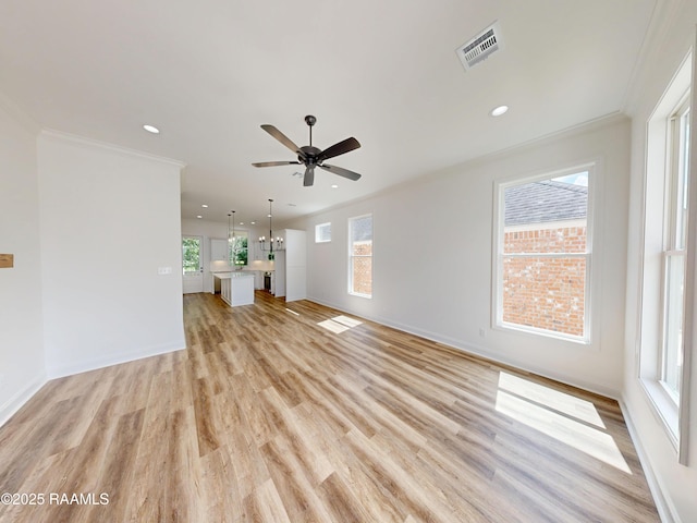 119 Chimney Rock Blvd, Lafayette, LA 70508 - unfurnished living room featuring ornamental molding, healthy amount of natural light, a ceiling fan, light wood-style flooring, and recessed lighting