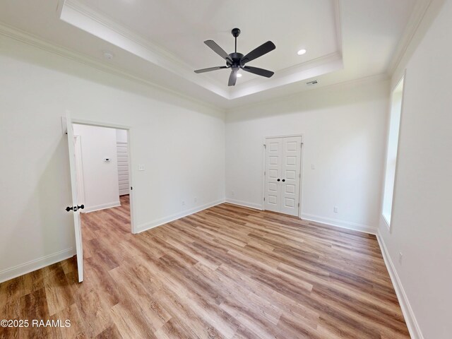 119 Chimney Rock Blvd, Lafayette, LA 70508 - unfurnished room featuring a raised ceiling, ornamental molding, ceiling fan, light wood-type flooring, and recessed lighting