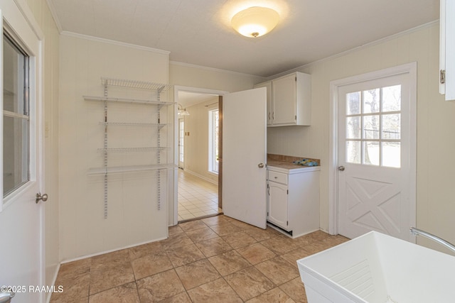 laundry room with ornamental molding