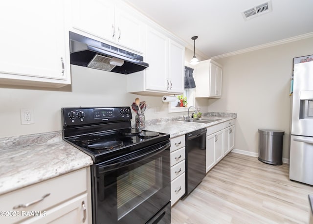 kitchen featuring visible vents, black appliances, under cabinet range hood, a sink, and white cabinetry