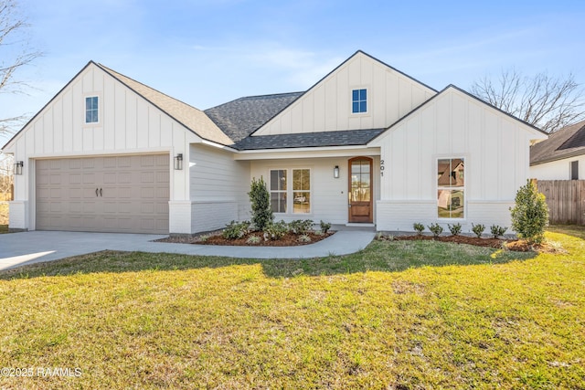 modern farmhouse with a shingled roof, board and batten siding, fence, driveway, and a front lawn