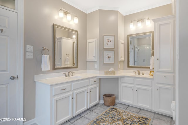 full bathroom featuring a sink, a shower, ornamental molding, and double vanity