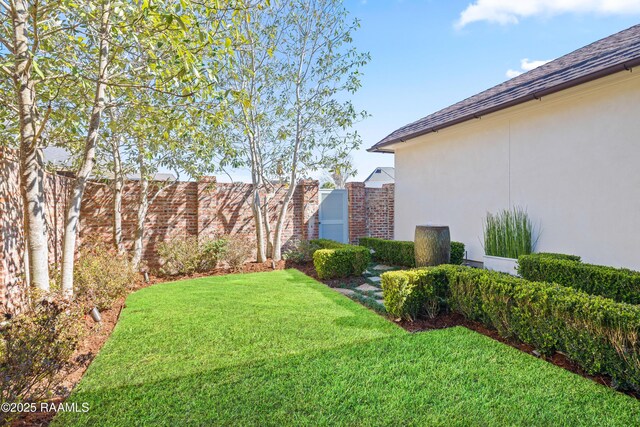 view of yard with fence