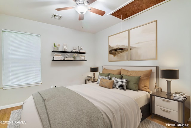 717 S Sterling St, Lafayette, LA 70501 - bedroom featuring wood finished floors, attic access, and ceiling fan