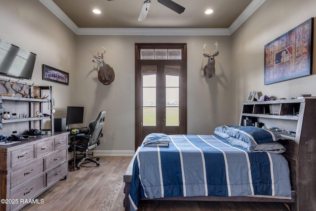 bedroom with baseboards, wood finished floors, crown molding, french doors, and recessed lighting