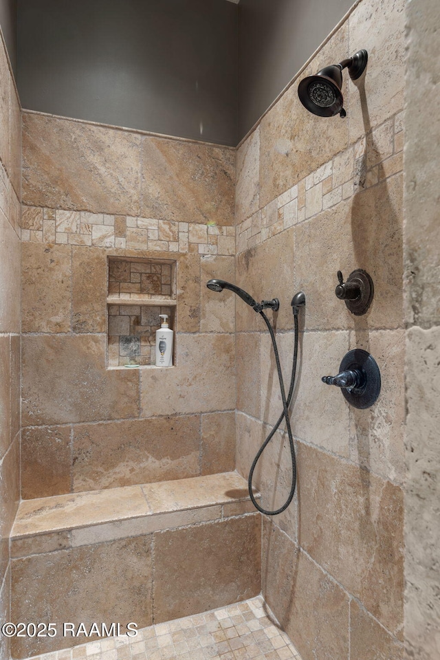 full bath featuring tiled shower