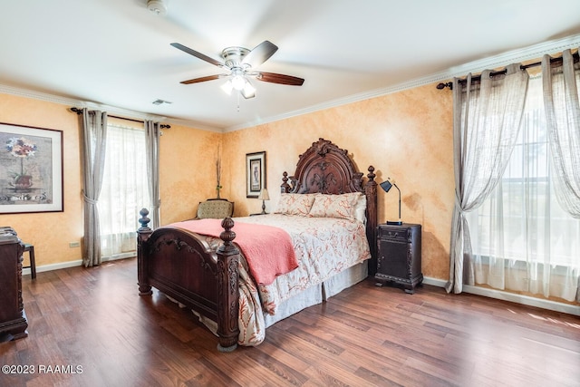 bedroom with baseboards, visible vents, ceiling fan, ornamental molding, and wood finished floors