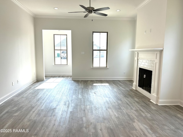 211 Bennington Ln, Youngsville, LA 70592 - unfurnished living room featuring a ceiling fan, wood finished floors, a fireplace, baseboards, and crown molding