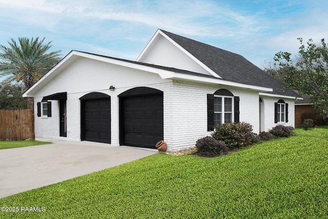 view of property exterior featuring concrete driveway, brick siding, a lawn, and an attached garage