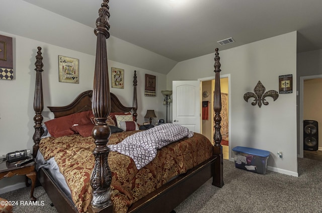 bedroom with visible vents, carpet floors, baseboards, and vaulted ceiling