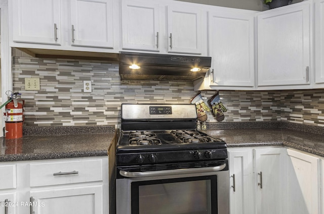 kitchen featuring under cabinet range hood, backsplash, white cabinetry, and stainless steel range with gas cooktop