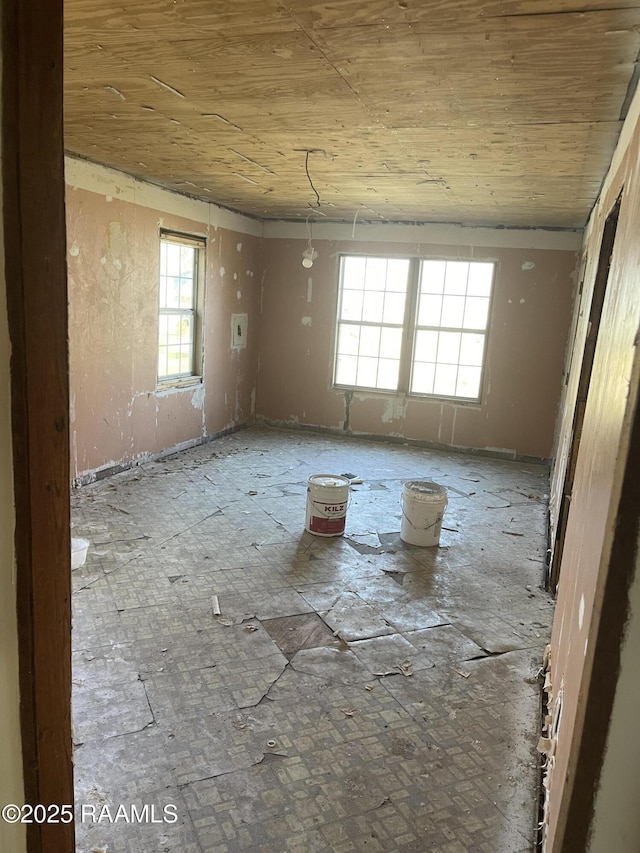 unfurnished room featuring wood ceiling