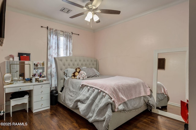 bedroom with visible vents, ornamental molding, ceiling fan, and wood-type flooring