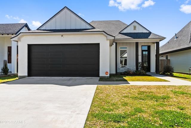 modern farmhouse style home with board and batten siding, a front yard, roof with shingles, a garage, and driveway