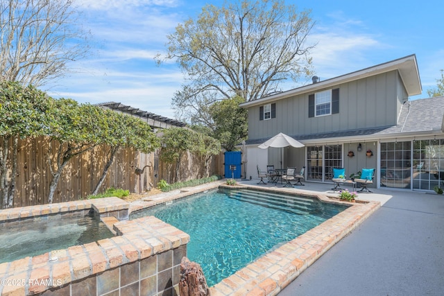 view of pool featuring a fenced in pool, a fenced backyard, and a patio area